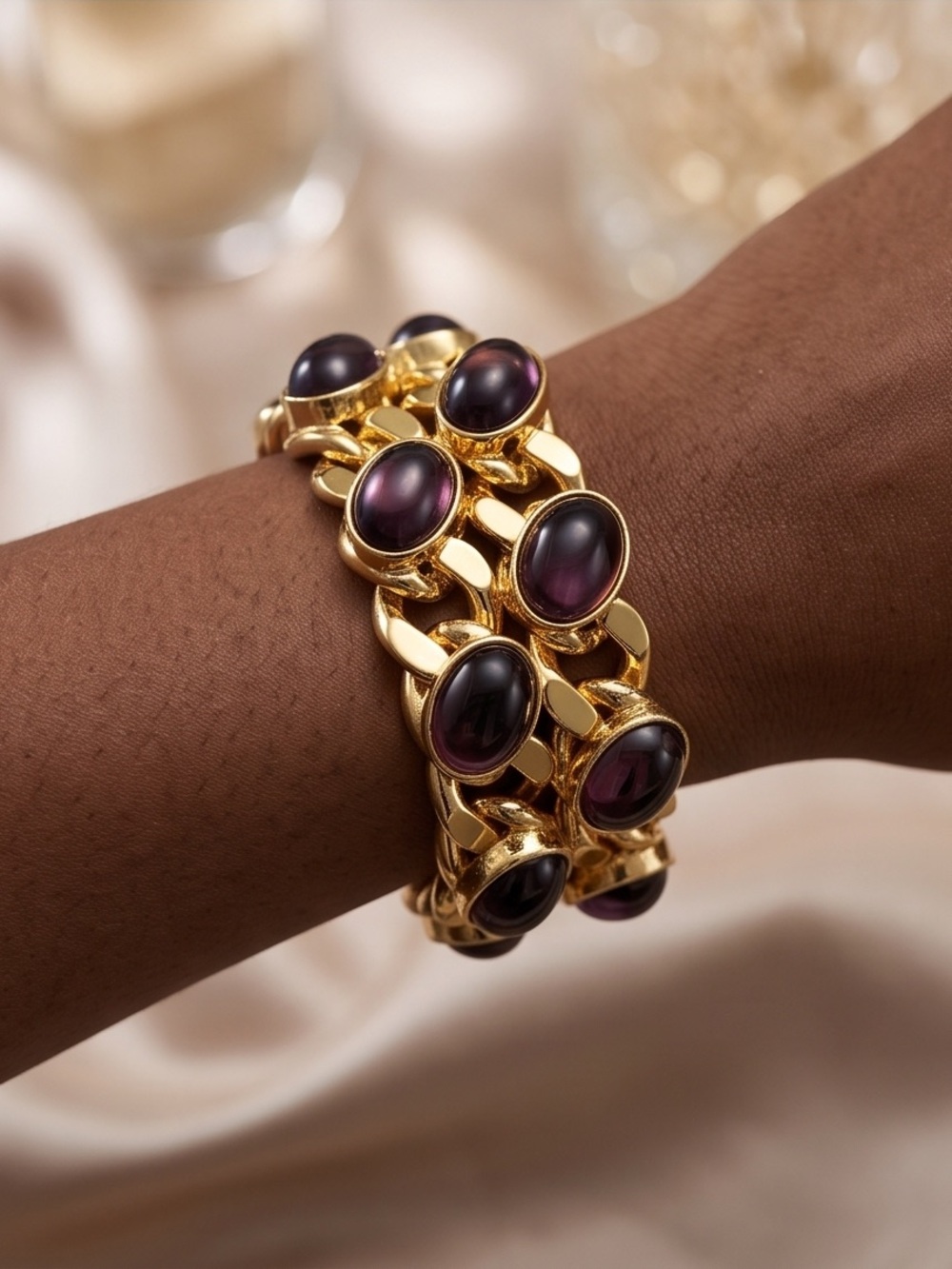 Gold-Plated Bracelet with Deep Purple Cabochon Stones